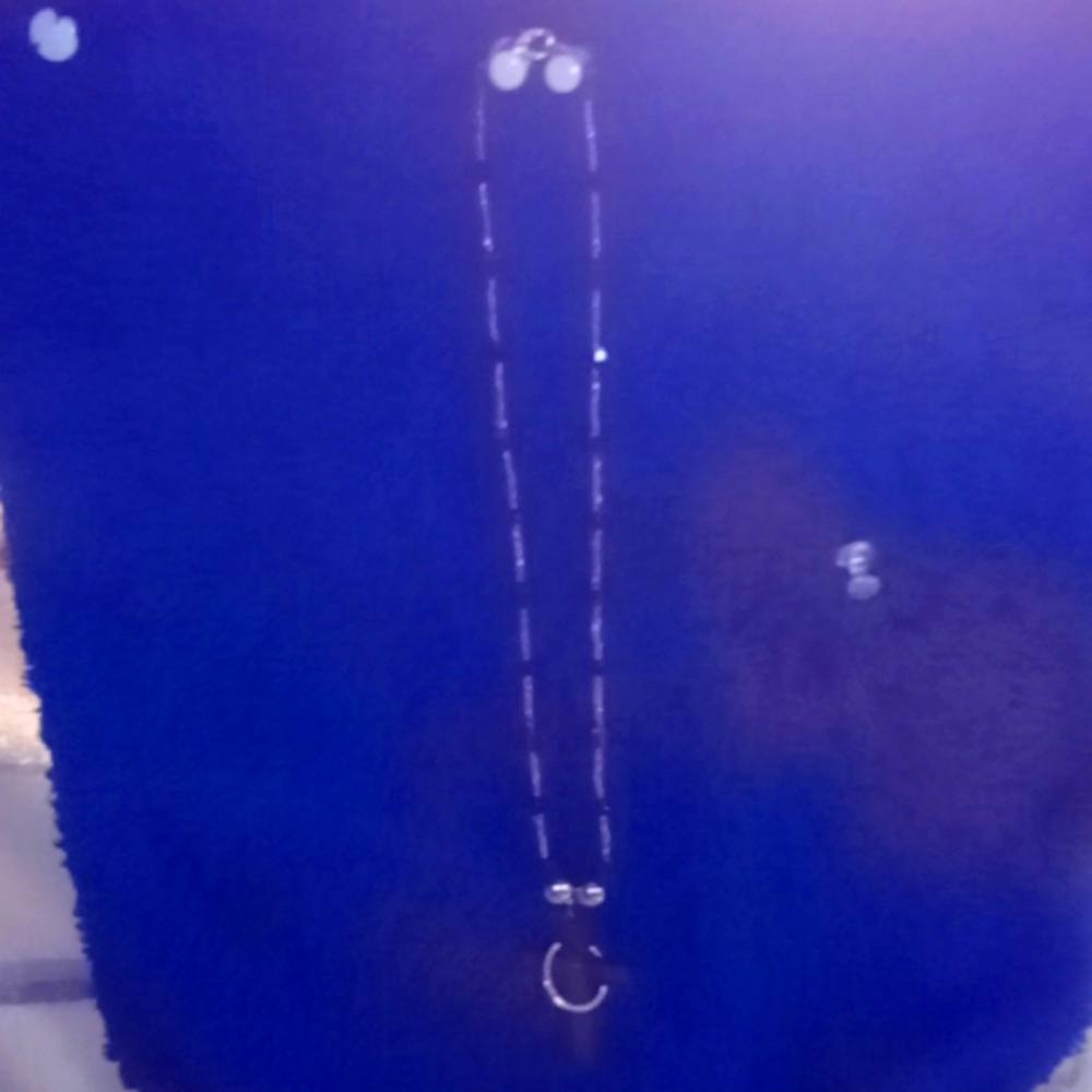 Handmade custom necklace with cross ring around it with the Lord's prayer on it